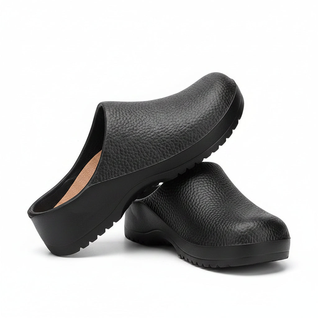 Black textured slip-on clogs with open back and thick ridged outsole