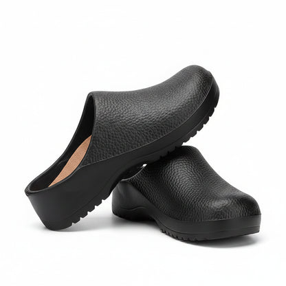 Black textured slip-on clogs with open back and thick ridged outsole