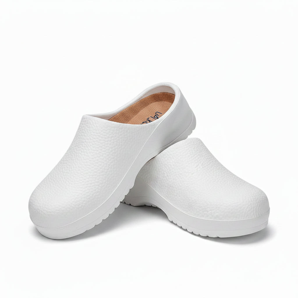 White textured slip-on clogs with open back and thick ridged non-slip outsole