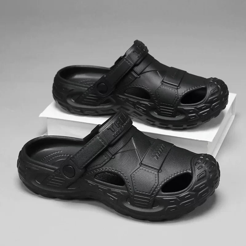Men's summer clog sandals in black, pair shown with adjustable strap and textured outsole