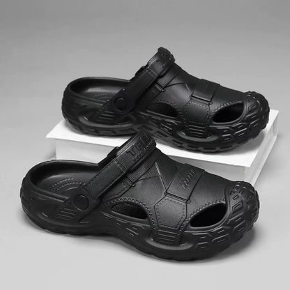Men's summer clog sandals in black, pair shown with adjustable strap and textured outsole