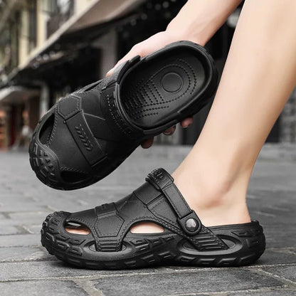 Men's summer clog sandals in black on feet with adjustable strap and cushioned top