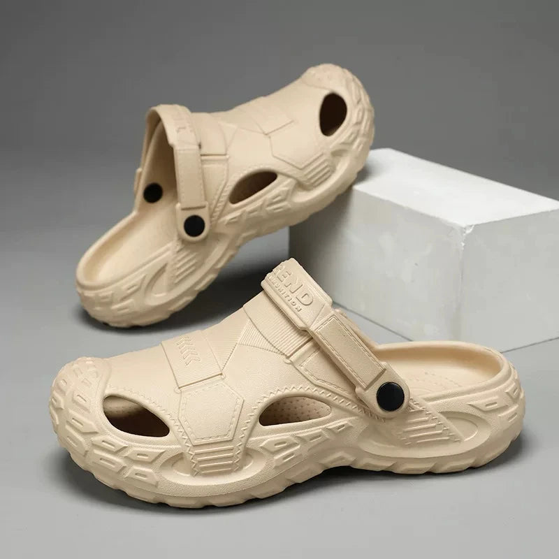 Men's summer clog sandals in cream with adjustable strap, side cutouts, and tread sole