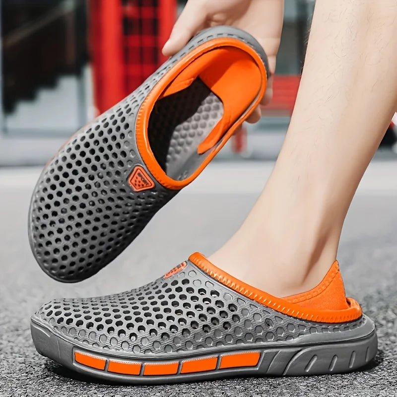 Geometric beach clogs, dark gray with orange trim, slip-on perforated design