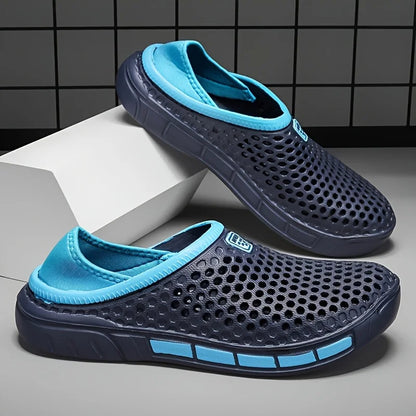 Geometric beach clogs, navy with light blue accents, slip-on perforated upper