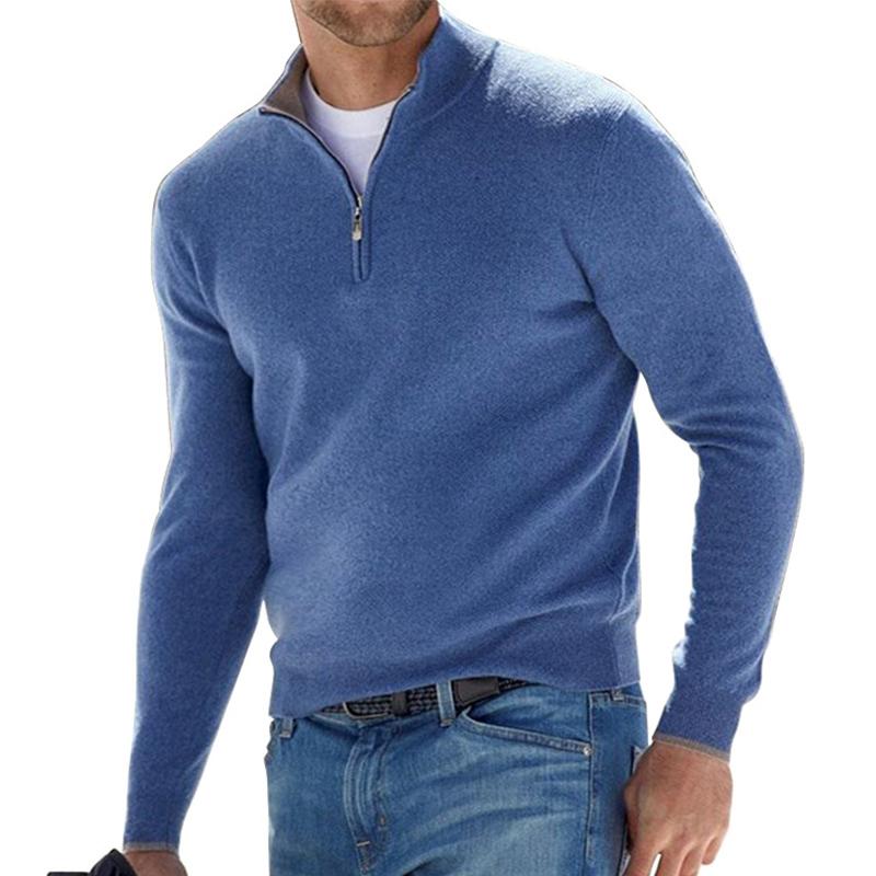 Blue half-zip pullover sweater with quarter zipper and ribbed cuffs.