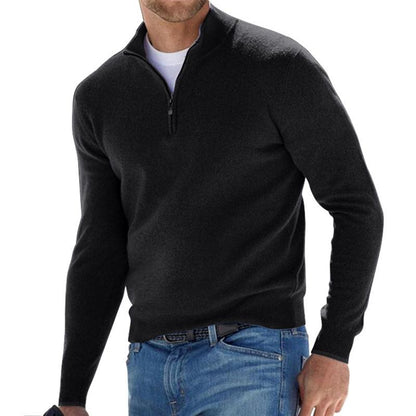Black half-zip pullover sweater with a short collar and center zipper.