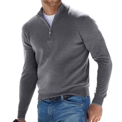 Grey half-zip pullover sweater with a quarter zipper and soft knit texture.