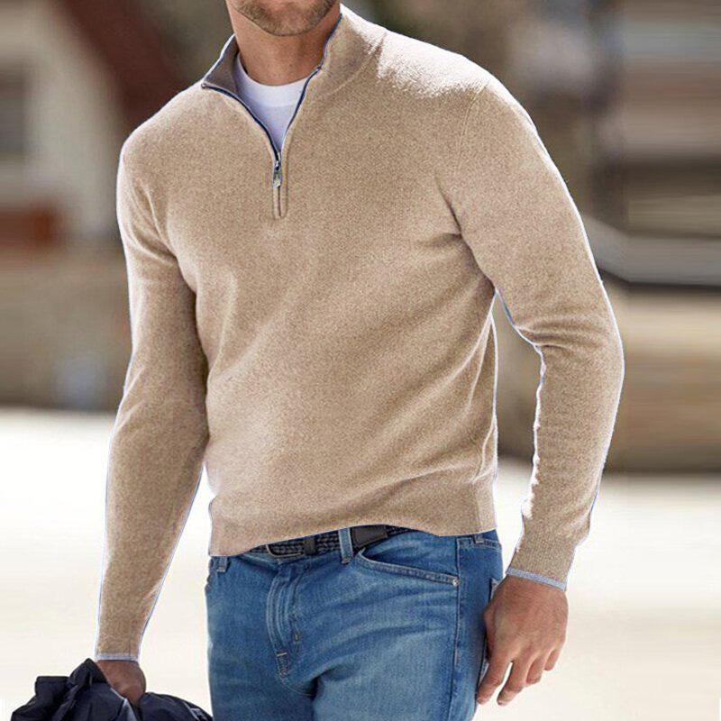 Beige half-zip pullover sweater with a short collar and chest zipper.