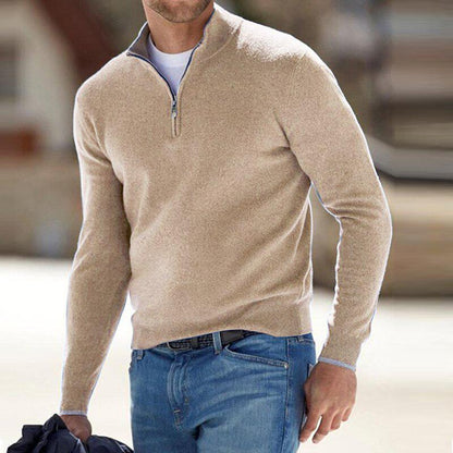 Beige half-zip pullover sweater with a short collar and chest zipper.