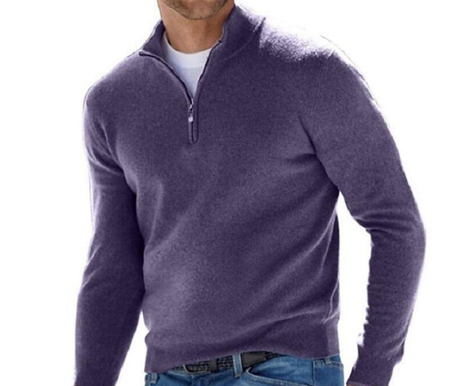 Dark purple half-zip pullover sweater with a short collar and center zipper.