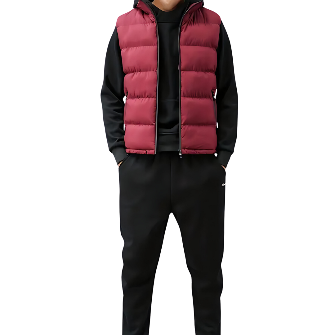 Men’s quilted puffer vest in red with front zipper, worn over a dark hoodie