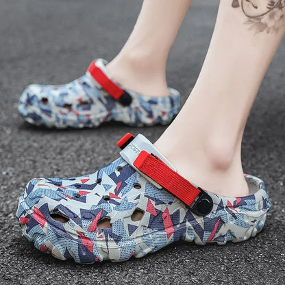 Camouflage clog slipper with red strap worn on foot for outdoor use