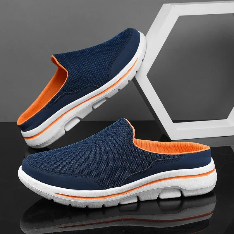 Breathable backless slip-on slippers in navy with orange trim and thick white sole