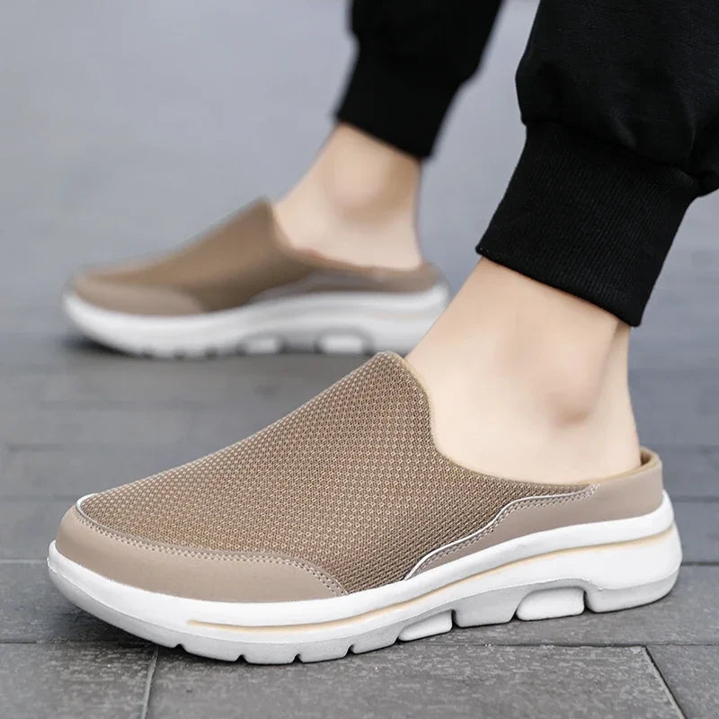 Beige backless slip-on slippers with white sole and cushioned tread
