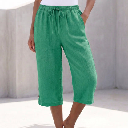 Green relaxed-fit calf-length pants with drawstring waist and wide cropped legs