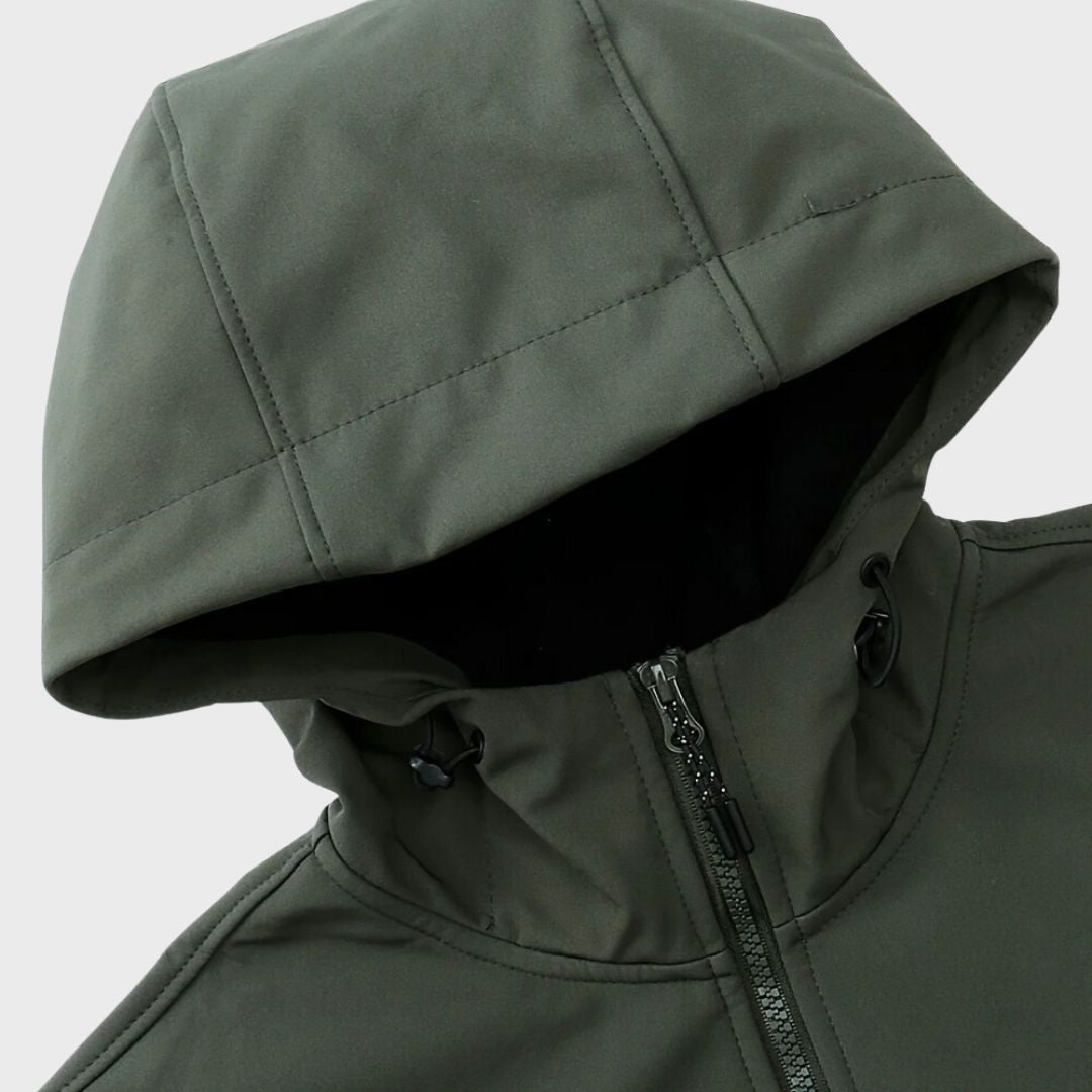 Olive green softshell jacket close-up of hood edge and zip pocket