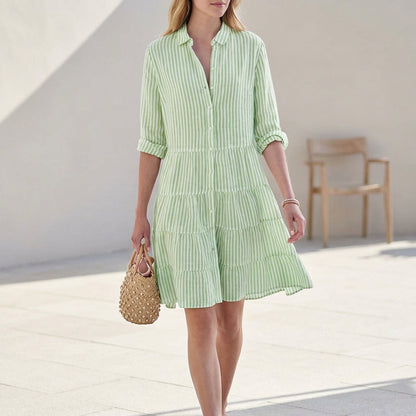 Green striped tiered shirtdress with button front and three-quarter sleeves