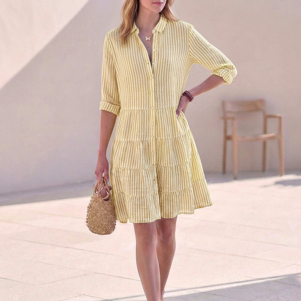 Yellow striped tiered shirtdress with button front and three-quarter sleeves