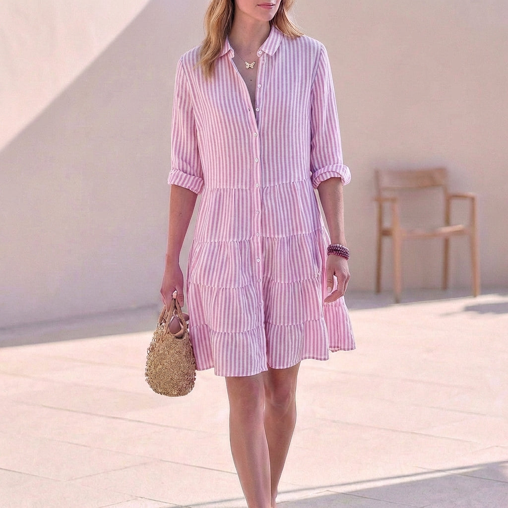 Light pink striped tiered shirtdress with button front and three-quarter sleeves