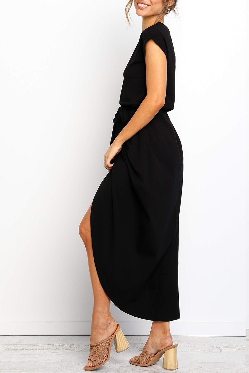 Black cap-sleeve belted maxi dress, side view with draped skirt and slit