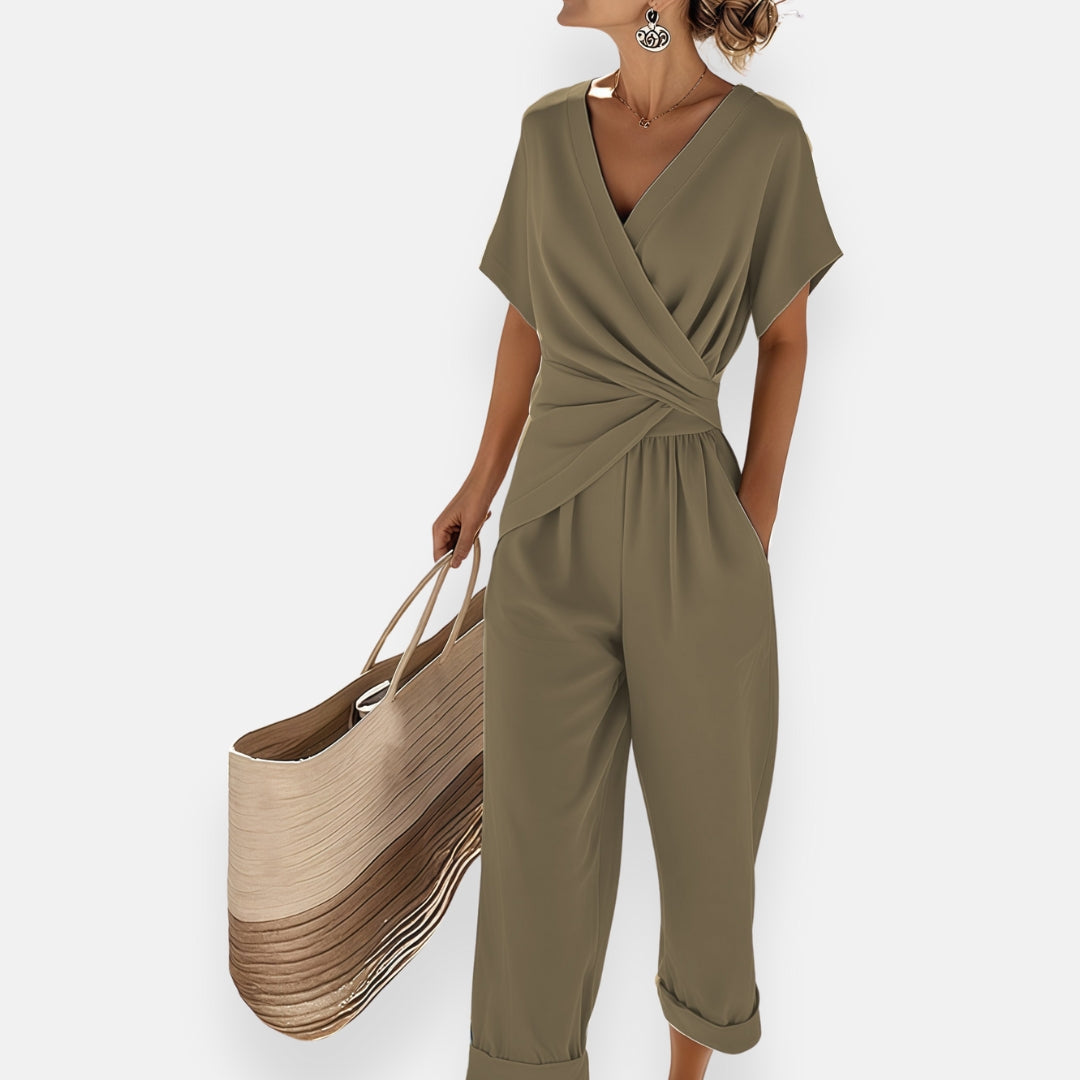 Olive wrap jumpsuit with V-neck, short sleeves, draped waist, wide cropped legs