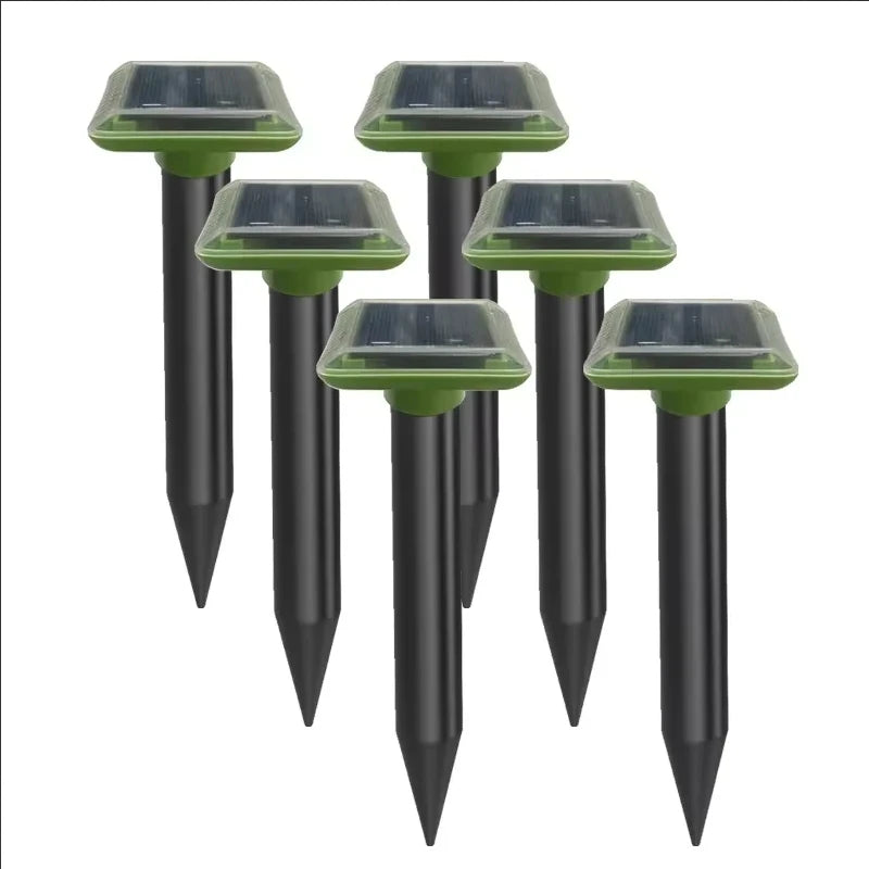 Solar ultrasonic mole repellent spike pack with multiple black stakes and green tops