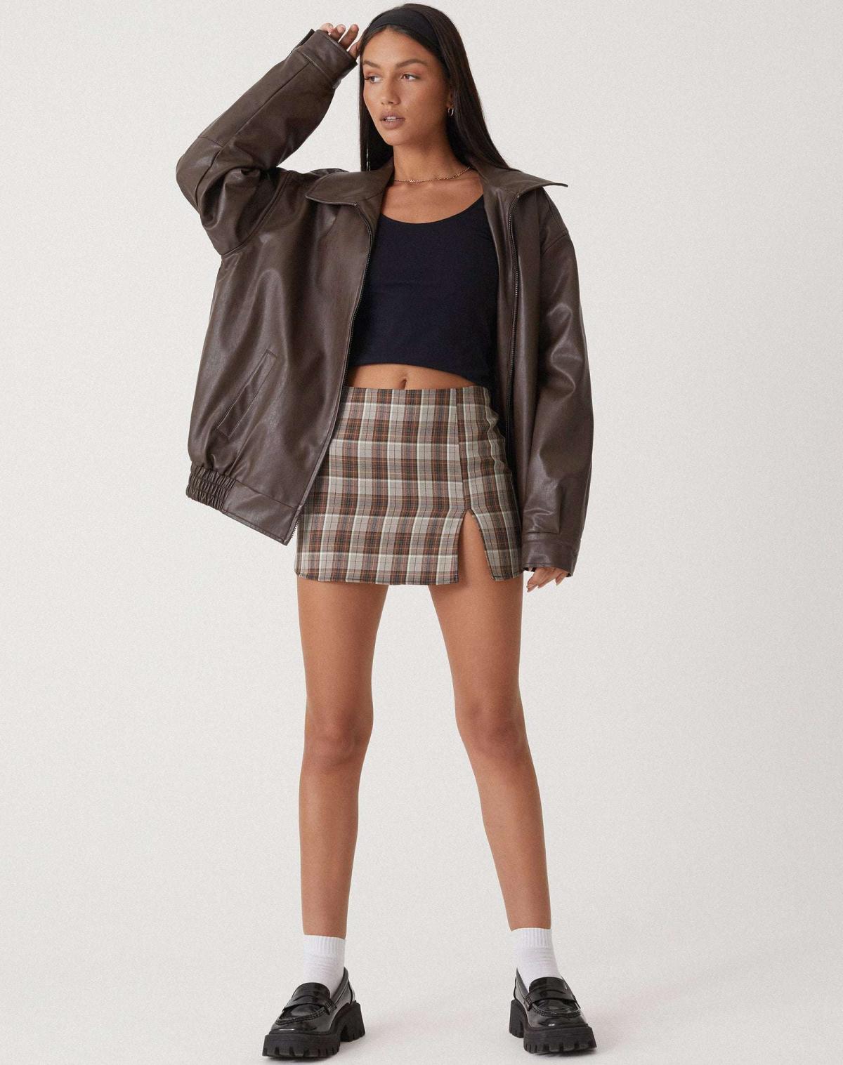 Brown oversized PU leather bomber jacket with zip front and elastic hem and cuffs.