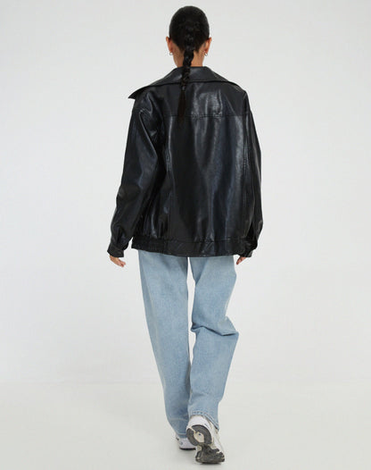 Black oversized PU leather jacket back view with full-length zip and elastic hem.