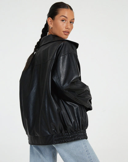 Black oversized PU leather bomber jacket with zip front and gathered elastic cuffs and hem.