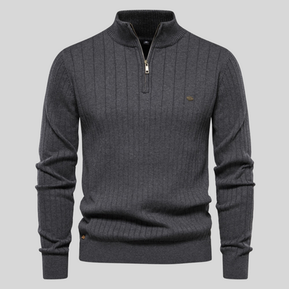 Ribbed half-zip knit sweater in dark grey, long sleeves, stand collar, small chest logo.