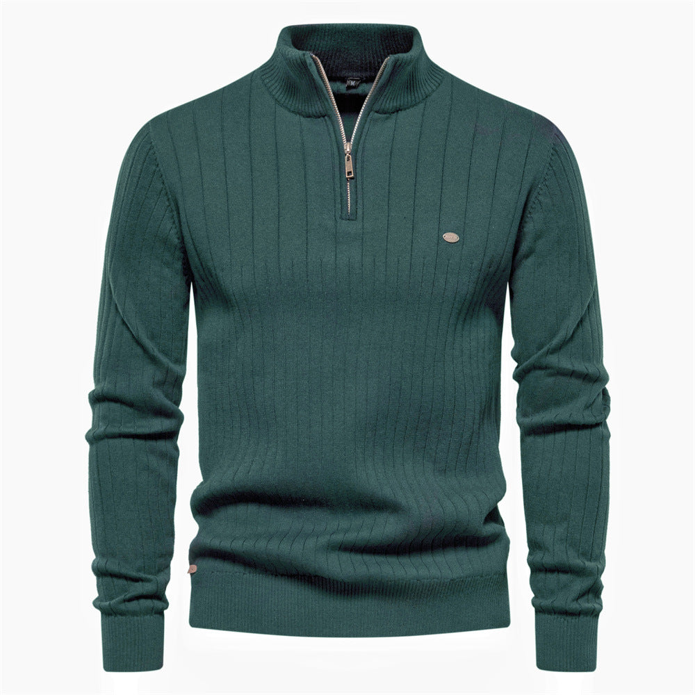 Ribbed half-zip knit sweater in green, long sleeves, stand collar, small chest logo.
