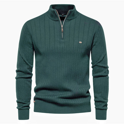 Ribbed half-zip knit sweater in green, long sleeves, stand collar, small chest logo.