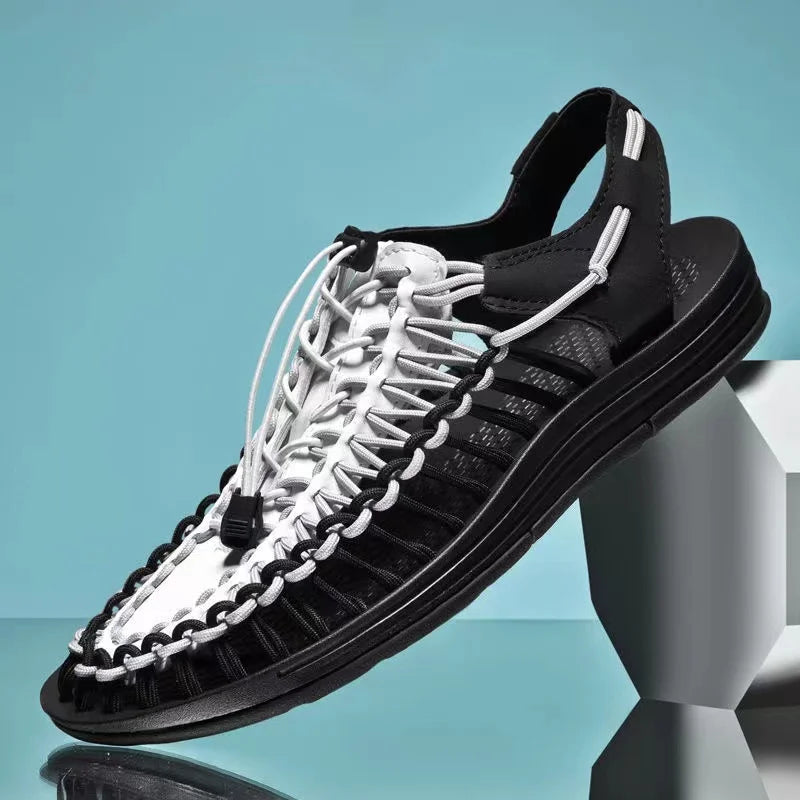 Black woven water shoes with white lace-up knit and black EVA sole.