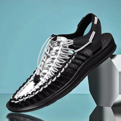 Black woven water shoes with white lace-up knit and black EVA sole.