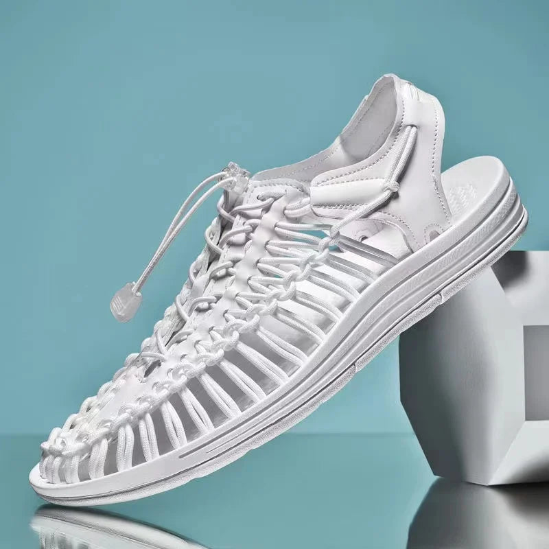 White woven water shoes with lace-up knit upper and white EVA sole.