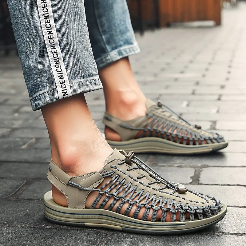 Tan woven water shoes with lace-up knit upper and olive-tone rubber sole