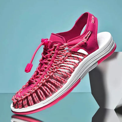 Fuchsia woven water shoes with lace-up knit upper and thick white rubber sole