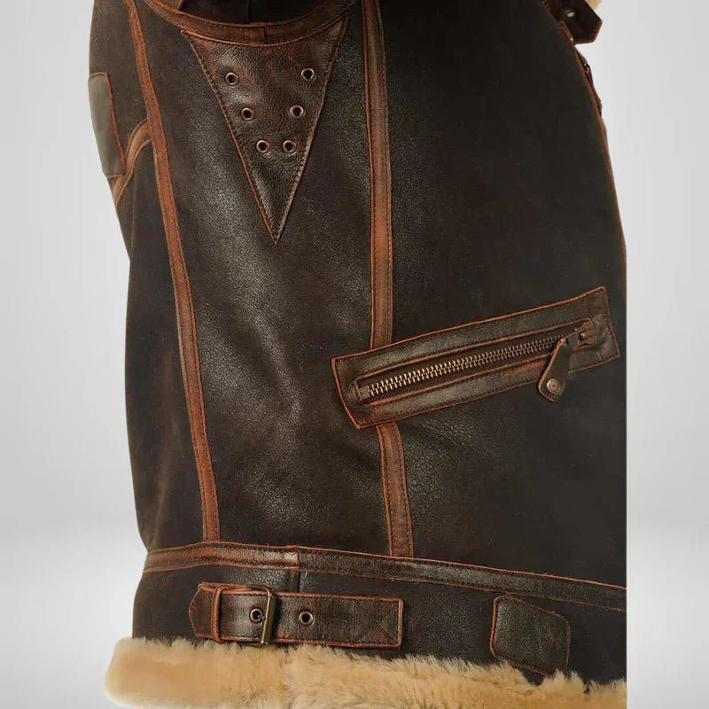 Men's shearling flight jacket front hem and belt with metal snaps and tan shearling trim
