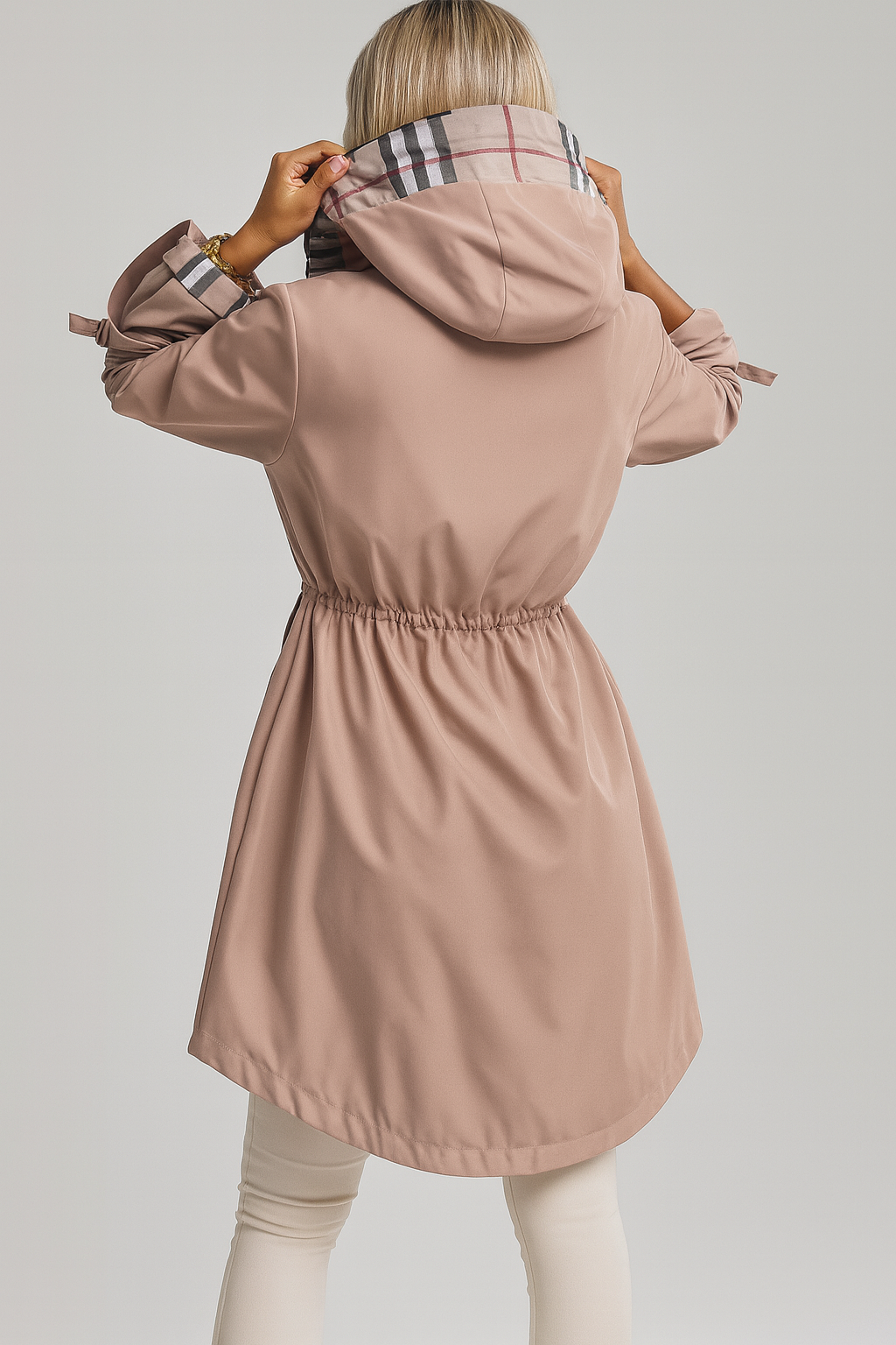 Women's hooded zip coat in beige, back view with plaid hood lining and waist ties
