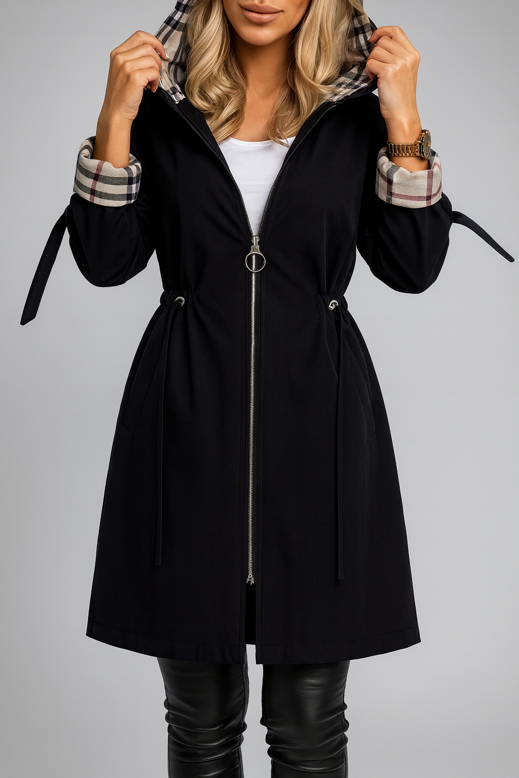 Women's hooded zip coat in black with plaid-lined cuffs and front zipper