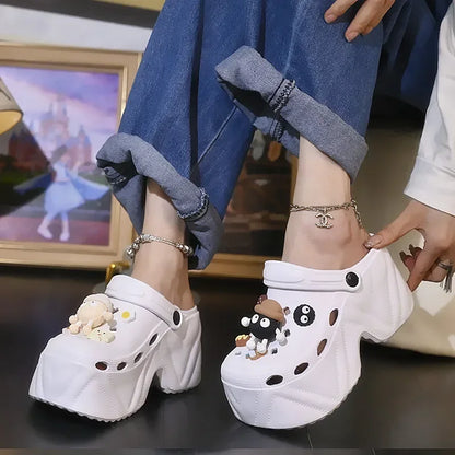 Women’s white platform clogs with charm dangles and thick EVA sole