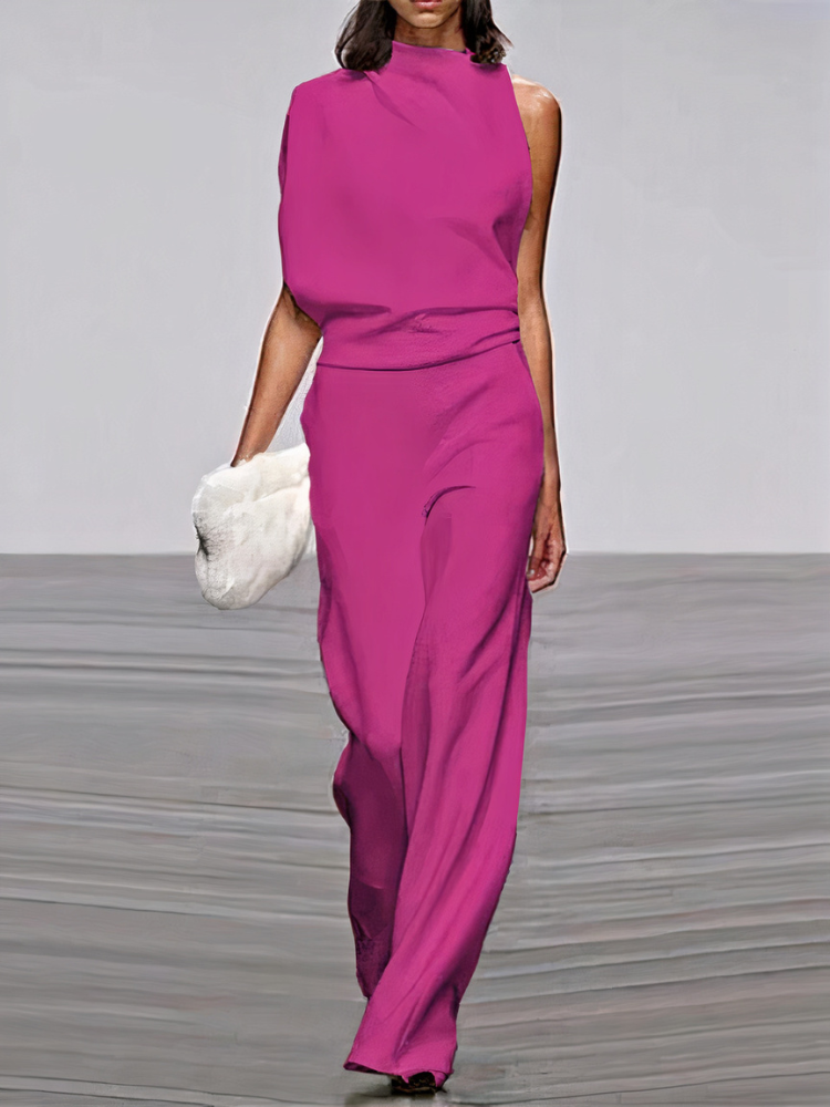 Magenta sleeveless high-neck wide-leg jumpsuit with draped waist and side cutouts