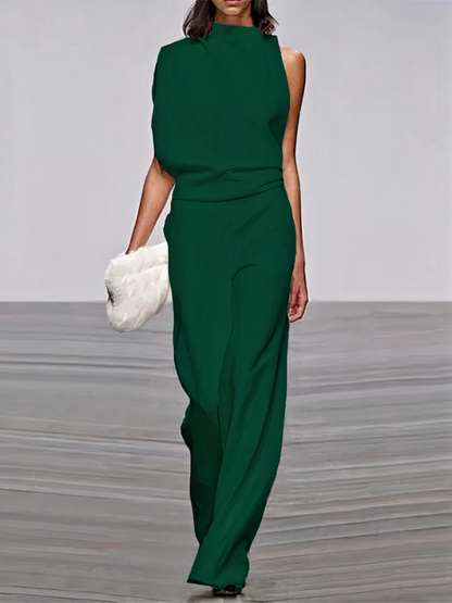 Dark green sleeveless high-neck wide-leg jumpsuit with draped waist and side cutouts