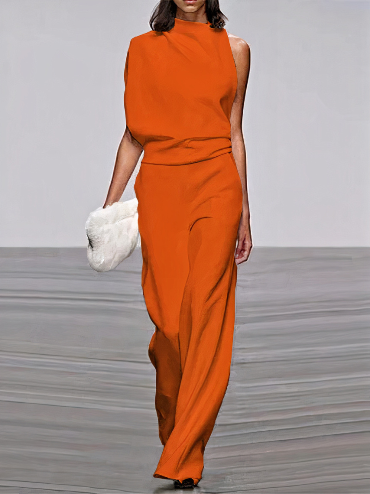 Orange sleeveless wide-leg jumpsuit with high neckline and fitted waist.
