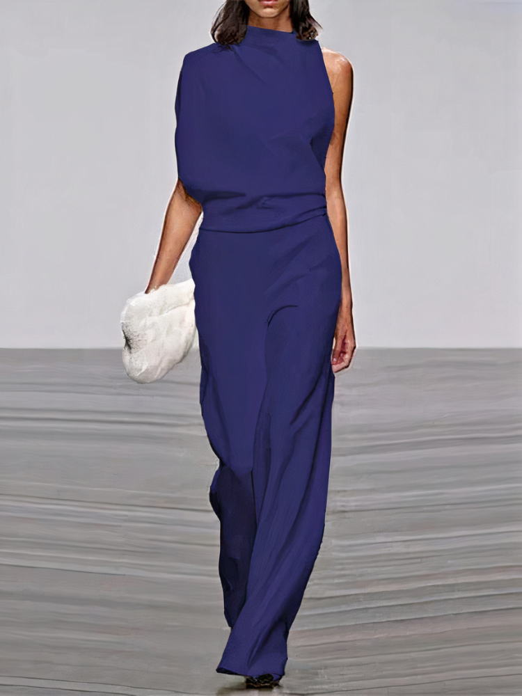 Navy sleeveless wide-leg jumpsuit with high neckline and fitted waist.