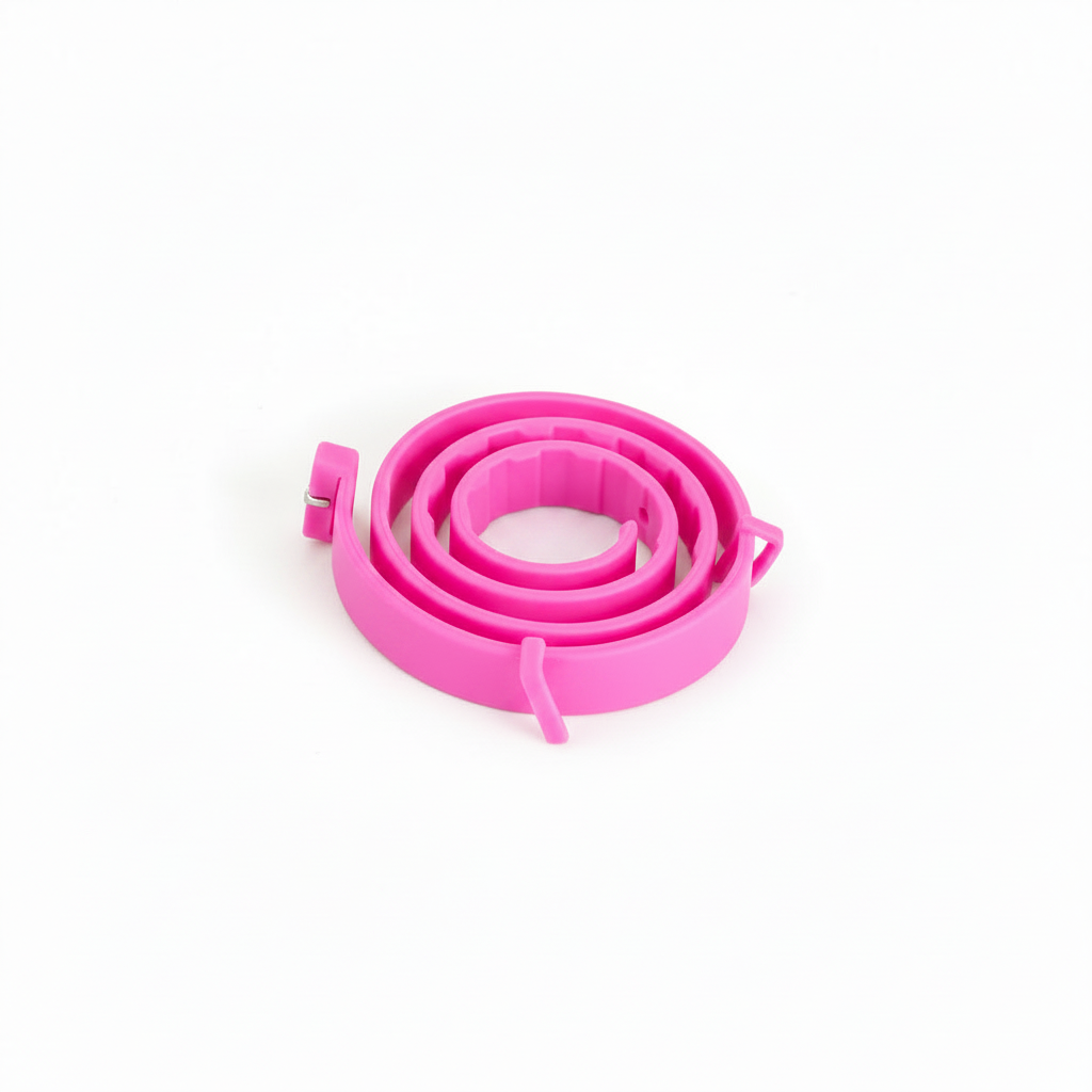 Adjustable pet calming collar, coiled pink strap with buckle and release tab