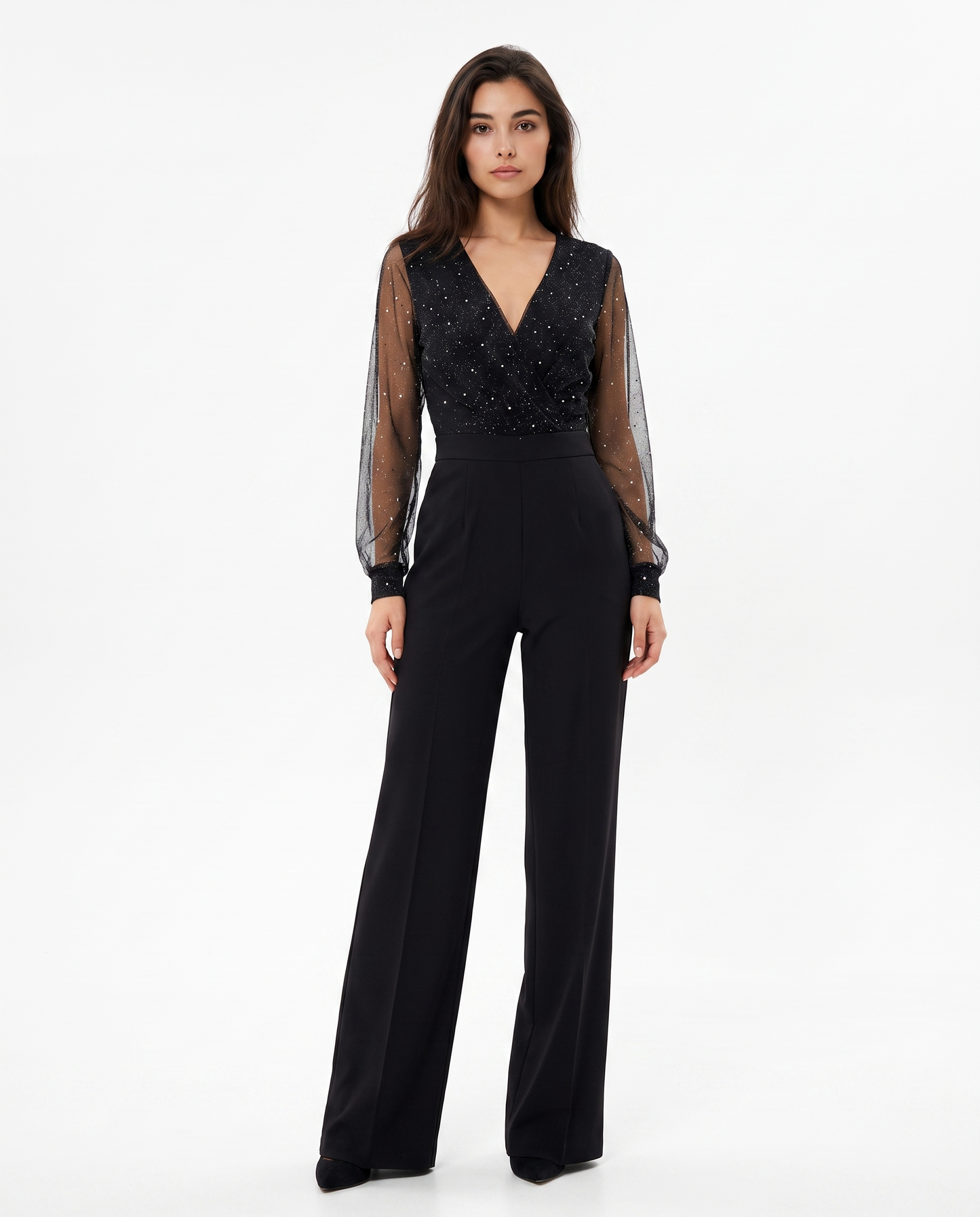 Women's black jumpsuit with sheer dotted long sleeves and V-neck wrap bodice