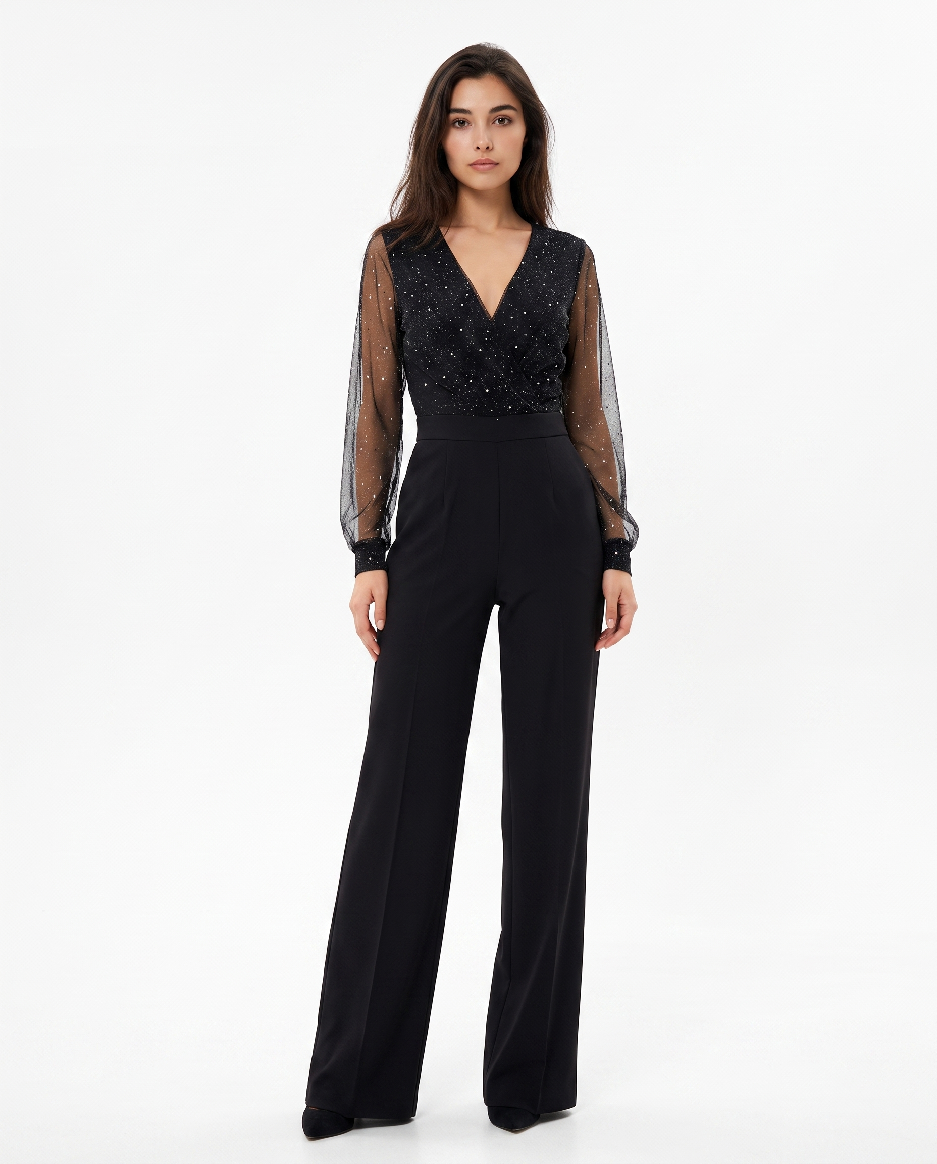 Women's black jumpsuit with sheer dotted long sleeves and V-neck wrap bodice