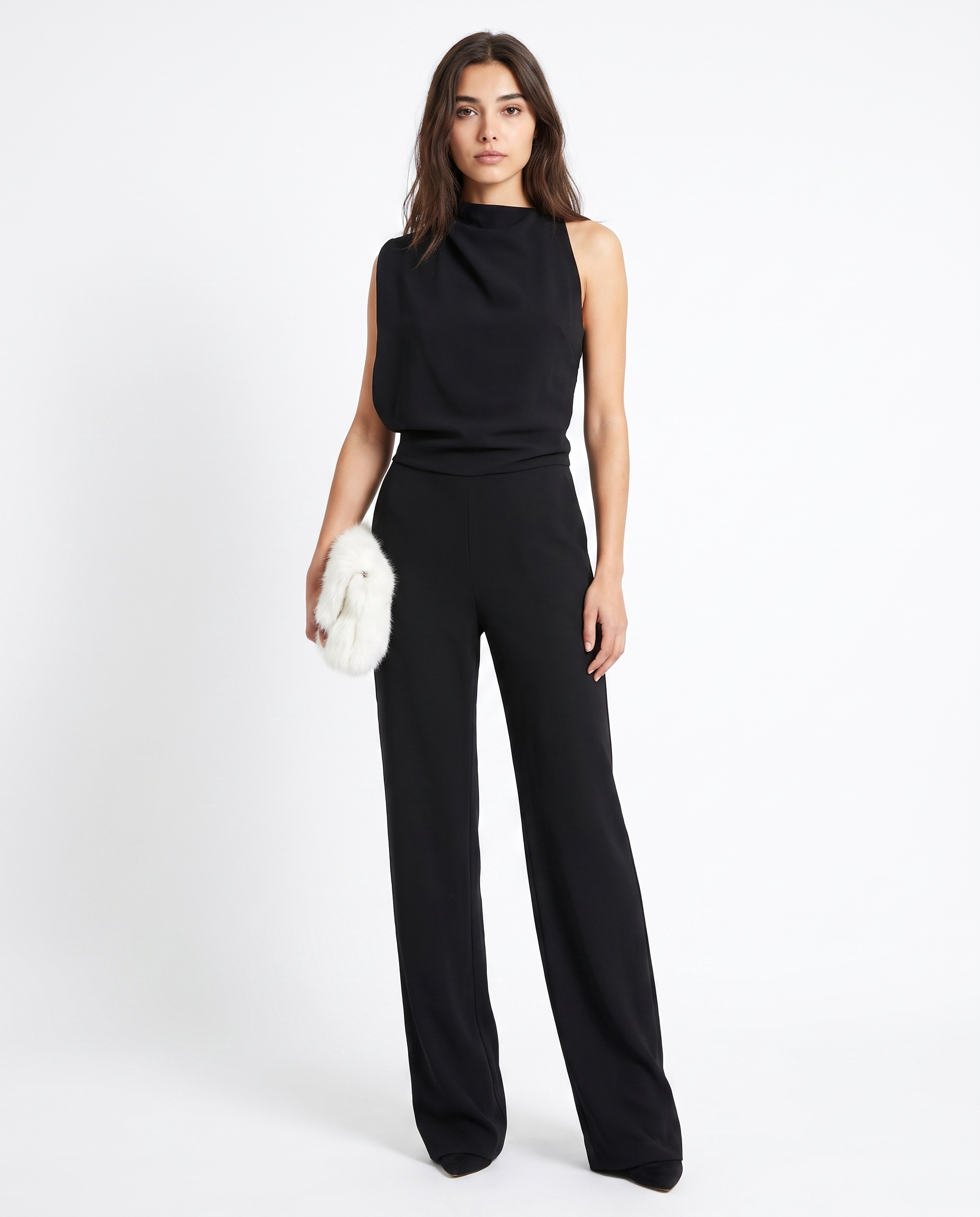Black sleeveless belted jumpsuit with round neck and wide-leg pants.